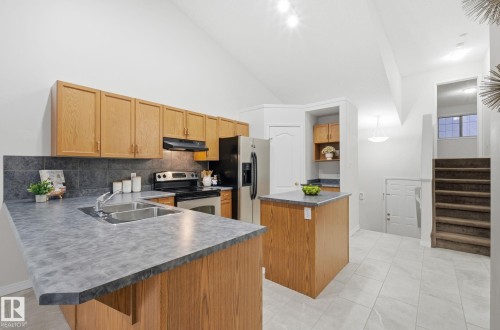 608 87 St, Edmonton, AB - Indoor Photo Showing Kitchen With Double Sink