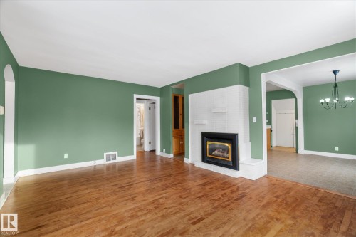 10429 143 Street, Edmonton, AB - Indoor Photo Showing Living Room With Fireplace