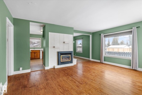 10429 143 Street, Edmonton, AB - Indoor Photo Showing Living Room With Fireplace