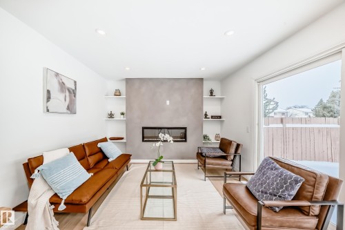 3867 85 Street, Edmonton, AB - Indoor Photo Showing Living Room With Fireplace