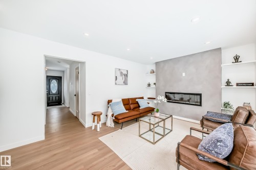 3867 85 Street, Edmonton, AB - Indoor Photo Showing Living Room With Fireplace