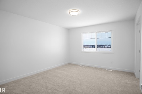 21 Emmett Way, Spruce Grove, AB - Indoor Photo Showing Other Room