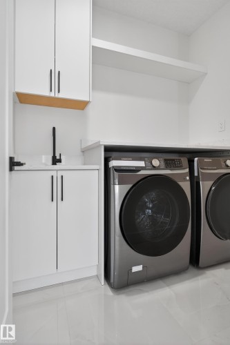 160 Edgewater Circle, Leduc, AB - Indoor Photo Showing Laundry Room