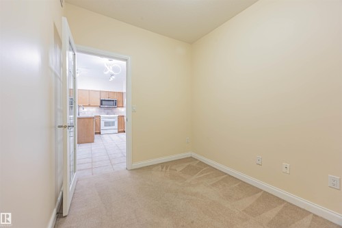 110 1406 Hodgson Way, Edmonton, AB - Indoor Photo Showing Other Room