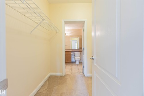 110 1406 Hodgson Way, Edmonton, AB - Indoor Photo Showing Other Room