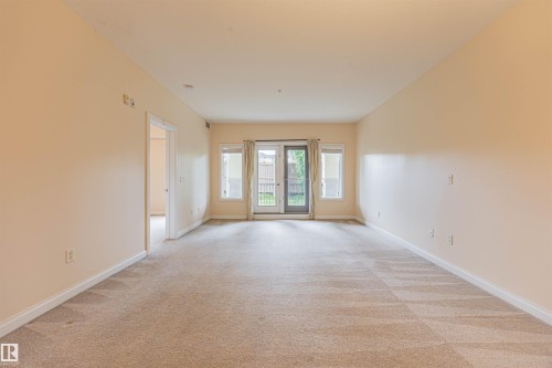 110 1406 Hodgson Way, Edmonton, AB - Indoor Photo Showing Other Room