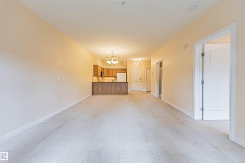 110 1406 Hodgson Way, Edmonton, AB - Indoor Photo Showing Other Room
