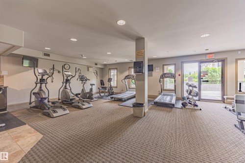 110 1406 Hodgson Way, Edmonton, AB - Indoor Photo Showing Gym Room