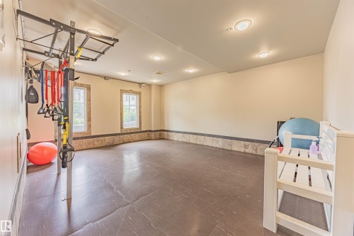 110 1406 Hodgson Way, Edmonton, AB - Indoor Photo Showing Other Room