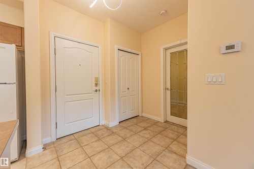 110 1406 Hodgson Way, Edmonton, AB - Indoor Photo Showing Other Room