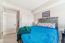 Bedroom with a closet and baseboards - 