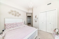 Bedroom with a chandelier and a closet - 