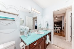 Bathroom featuring vanity and toilet - 
