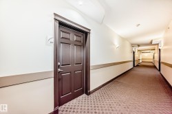Hallway featuring baseboards - 