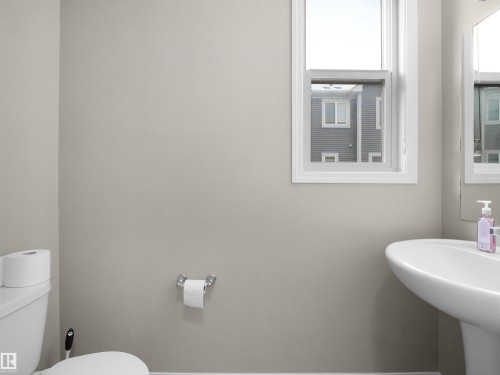Bathroom featuring toilet - 2080 Wonnacott Way, Edmonton, AB - Indoor Photo Showing Bathroom