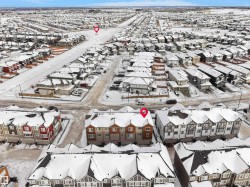 Snowy aerial view with a residential view - 