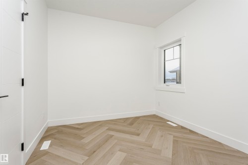 Empty room with baseboards - 220 Edgemont Green Green, Edmonton, AB - Indoor Photo Showing Other Room