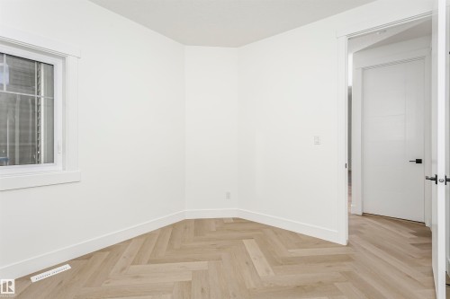 Spare room with baseboards - 220 Edgemont Green Green, Edmonton, AB - Indoor Photo Showing Other Room