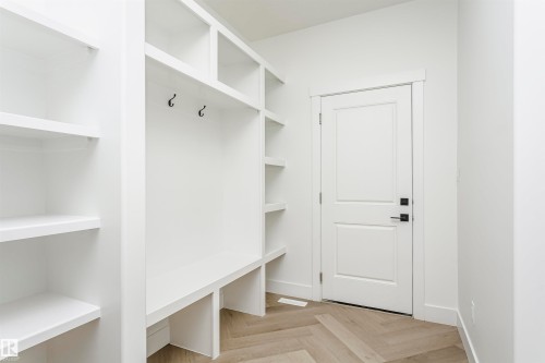 Mudroom with baseboards - 220 Edgemont Green Green, Edmonton, AB - Indoor With Storage