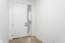 Entrance foyer featuring baseboards - 220 Edgemont Green Green, Edmonton, AB  - Indoor Photo Showing Other Room 