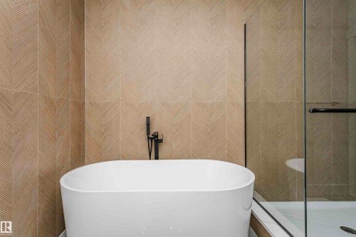 Full bathroom featuring a freestanding tub and a stall shower - 220 Edgemont Green Green, Edmonton, AB - Indoor Photo Showing Bathroom