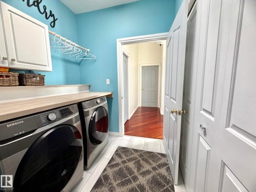 1207 Oakland Drive, Devon, AB - Indoor Photo Showing Laundry Room