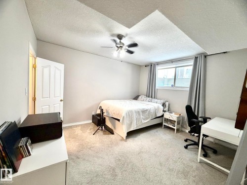 1207 Oakland Drive, Devon, AB - Indoor Photo Showing Bedroom