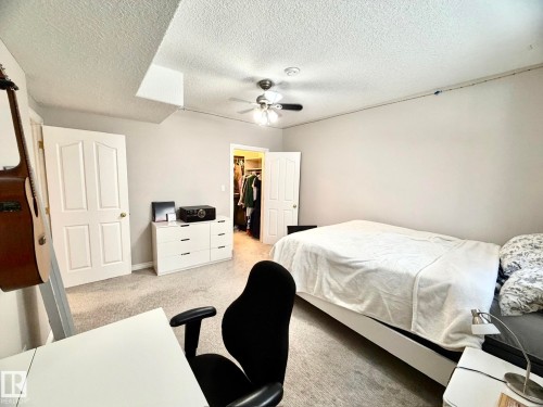 1207 Oakland Drive, Devon, AB - Indoor Photo Showing Bedroom