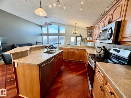 1207 Oakland Drive, Devon, AB - Indoor Photo Showing Kitchen With Double Sink