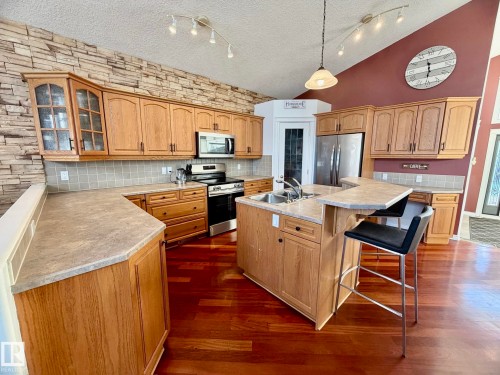 1207 Oakland Drive, Devon, AB - Indoor Photo Showing Kitchen With Double Sink