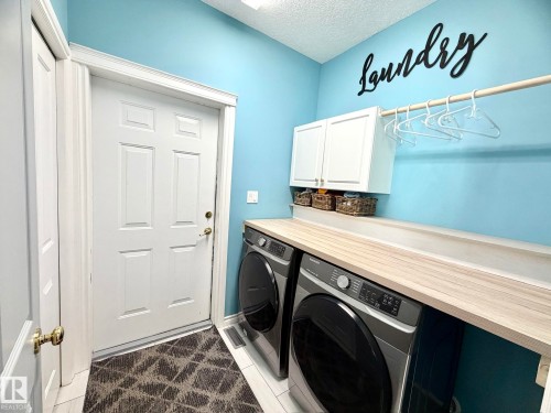 1207 Oakland Drive, Devon, AB - Indoor Photo Showing Laundry Room