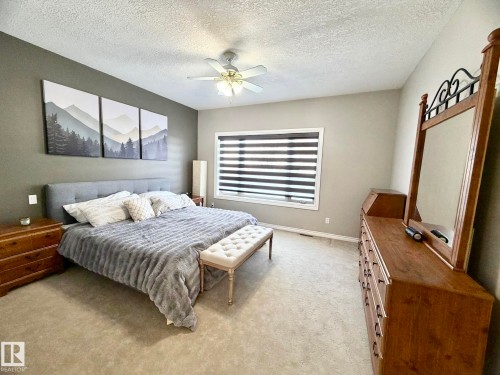 1207 Oakland Drive, Devon, AB - Indoor Photo Showing Bedroom