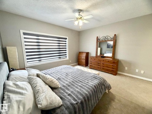 1207 Oakland Drive, Devon, AB - Indoor Photo Showing Bedroom
