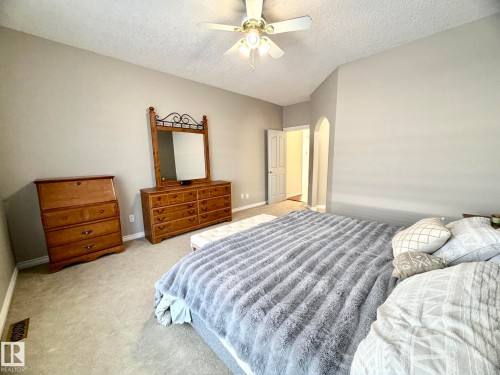 1207 Oakland Drive, Devon, AB - Indoor Photo Showing Bedroom