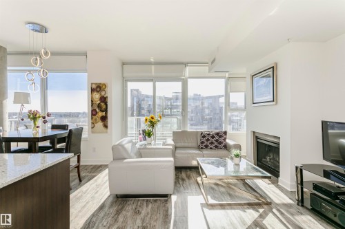 707 2612 109 Street, Edmonton, AB - Indoor Photo Showing Living Room With Fireplace
