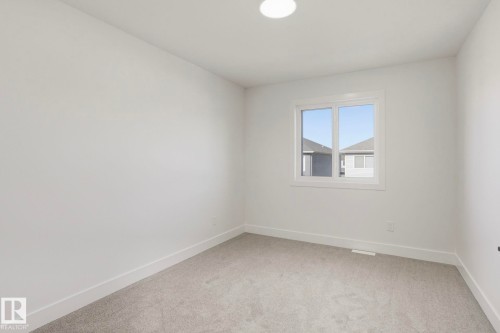 116 Spring Link, Spruce Grove, AB - Indoor Photo Showing Other Room