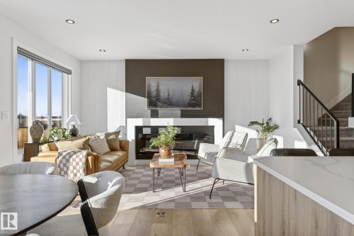 336 Meadowview Drive, Fort Saskatchewan, AB - Indoor Photo Showing Living Room With Fireplace
