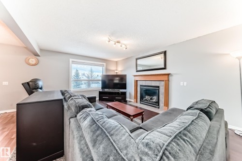 4713 190A Street, Edmonton, AB - Indoor Photo Showing Living Room With Fireplace