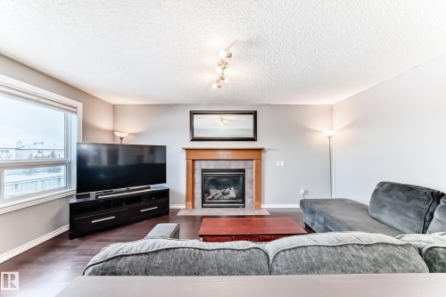 4713 190A Street, Edmonton, AB - Indoor Photo Showing Living Room With Fireplace