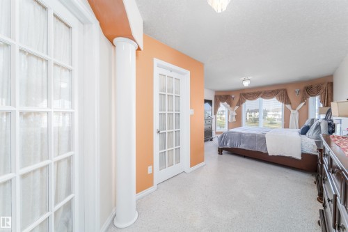 6928 164 Avenue, Edmonton, AB - Indoor Photo Showing Bedroom