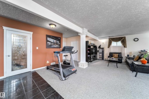 6928 164 Avenue, Edmonton, AB - Indoor Photo Showing Gym Room