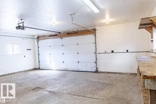 5002 52 Avenue, Calmar, AB - Indoor Photo Showing Garage