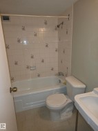 Full bathroom featuring vanity and shower / bath combination - 