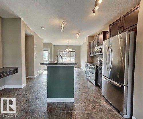 356 Southfork Drive, Leduc, AB - Indoor Photo Showing Kitchen With Upgraded Kitchen