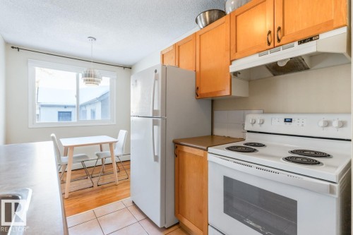 203 10230 120 Street, Edmonton, AB - Indoor Photo Showing Kitchen