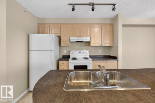 408 636 Mcallister Loop, Edmonton, AB - Indoor Photo Showing Kitchen With Double Sink