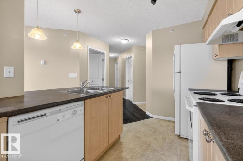 408 636 Mcallister Loop, Edmonton, AB - Indoor Photo Showing Kitchen With Double Sink