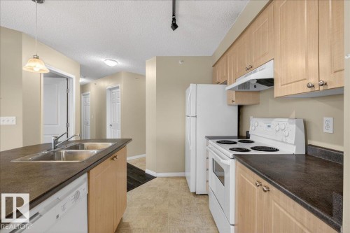 408 636 Mcallister Loop, Edmonton, AB - Indoor Photo Showing Kitchen With Double Sink