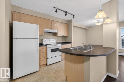 408 636 Mcallister Loop, Edmonton, AB - Indoor Photo Showing Kitchen With Double Sink