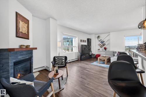 704 9707 105 Street, Edmonton, AB - Indoor Photo Showing Living Room With Fireplace